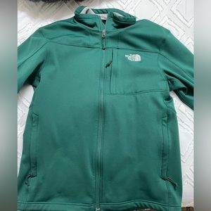 Forest green Northface mens medium or women’s large fleece lined zip up jacket.